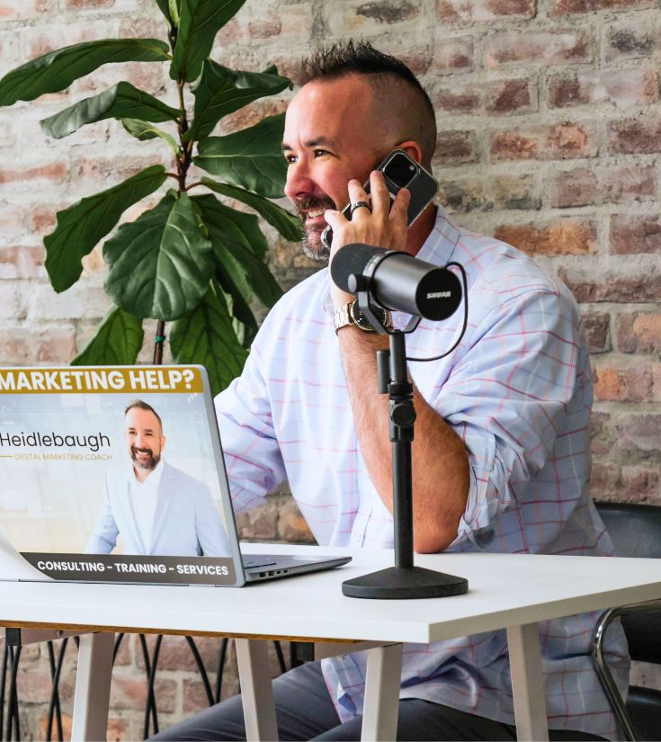 chris heidlebaugh working with clients on phone